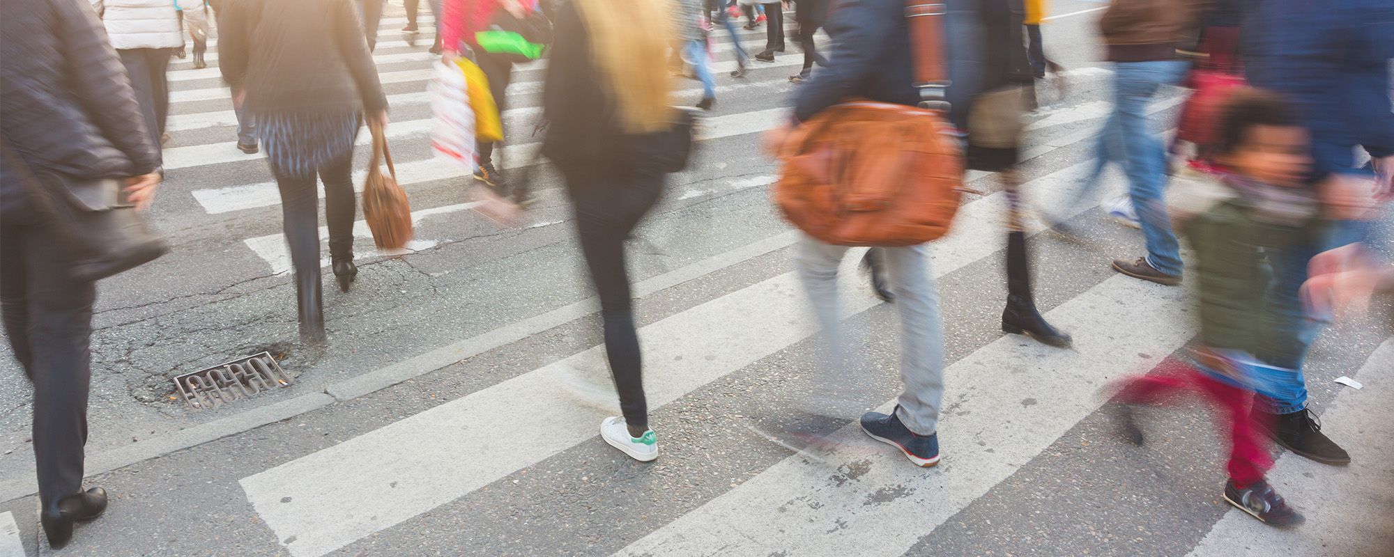 blurred crowd of people walking on zebra crossin in copenhagen