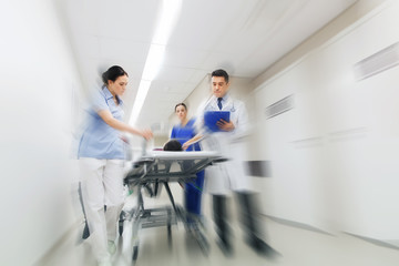 person on stretcher in hospital