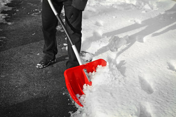 person shoveling snow
