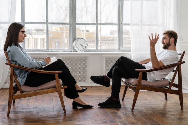man talking to therapist