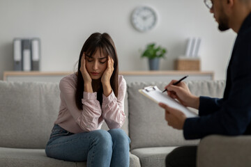 woman with ptsd in therapy